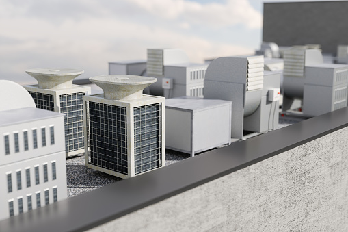 Close-up View Of Air Conditioning Units On Building Rooftop