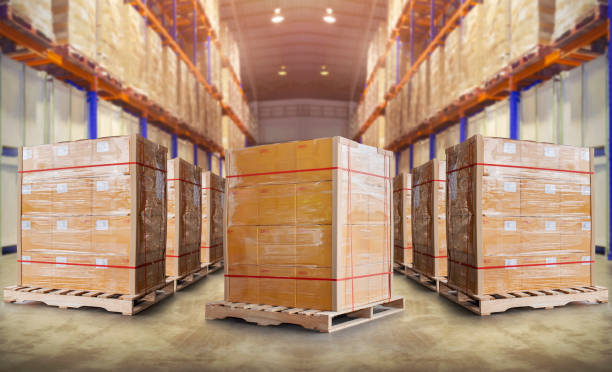 istock Packaging Boxes Wrapped Plastic Stacked on Pallets in Storage Warehouse. Supply Chain. Storehouse Distribution. Cargo Shipping Supplies Warehouse Logistics. 1412598165
