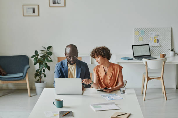 istock Business colleagues working with online project 1412598180