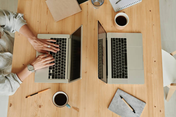 istock Woman typing on laptop online 1412598383
