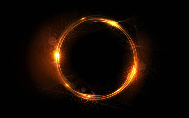 istock Abstract isolated round frame in golden hue on a black background 1412598624