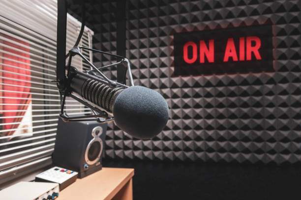 istock Professional microphone and on air sign 1412601200