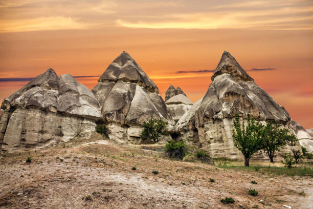 istock Cappadocia, Turkey. Sunset volcanic rock landscape 1412604095