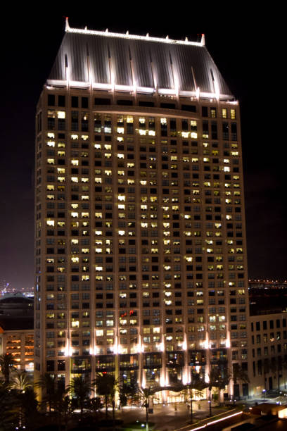 istock Tall Building Lit up in the Night Sky 1412604508