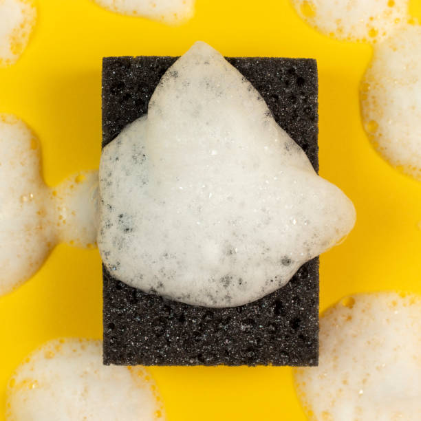 istock Black washing sponge with foam. 1412607025