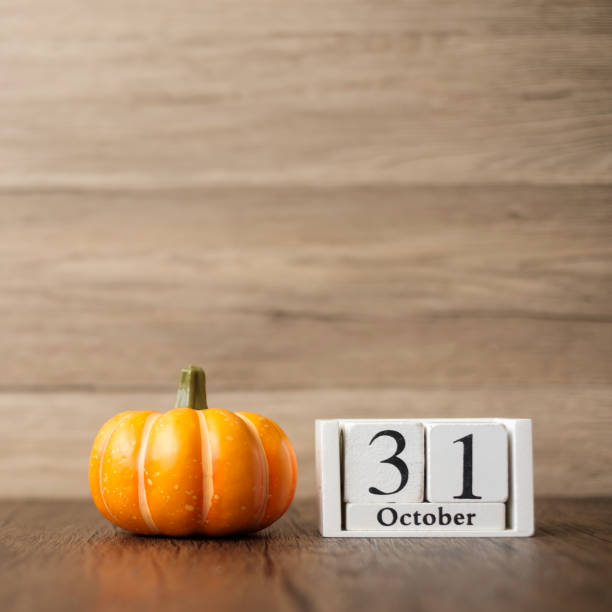 istock Happy Halloween day with pumpkin and 31 October calendar. Trick or Threat, Hello October, fall autumn, Festive, party and holiday concept 1412607895