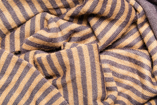 Abstract brown stripes cloth wallpaper.