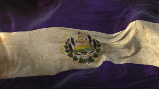 Old El Salvador Flag waving at wind. Loop