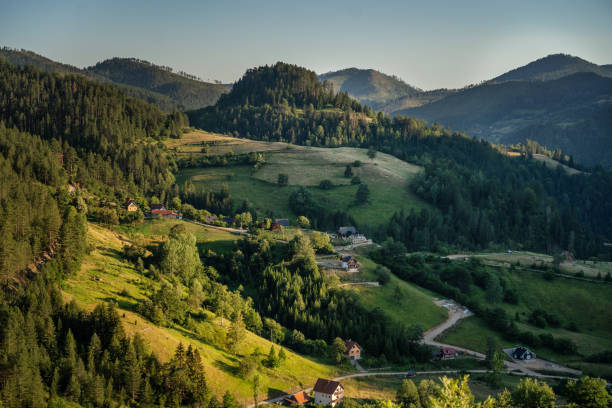 Village in Tara national natural park in Serbia at sunset time. Rural beautiful scenery stock photo