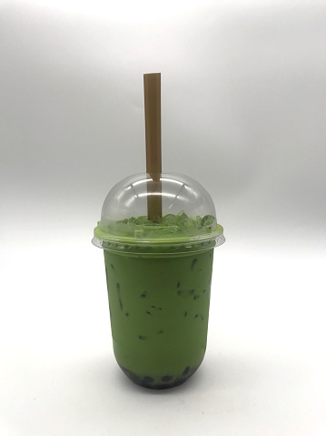 Green Tea Lava Pearls in a plastic cup with a tube,Include Clipping Path.