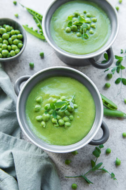 istock Fresh vegetable soup made of green peas 1412611910