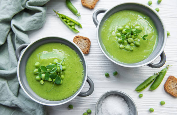 istock Fresh vegetable soup made of green peas 1412611911