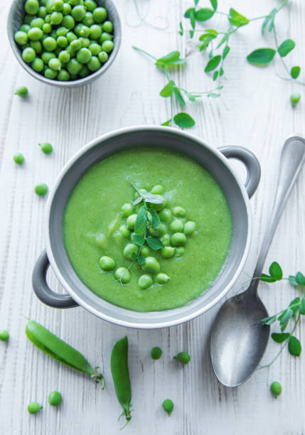 istock Fresh vegetable soup made of green peas 1412611913
