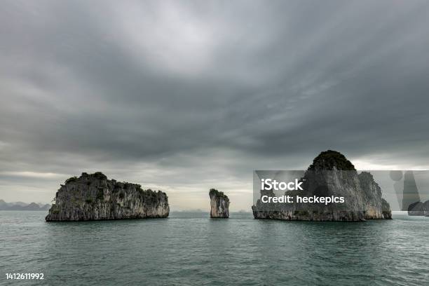 The Island And Rocks Of The Ha Long Bay In Vietnam Stock Photo - Download Image Now - Hạ Long Bay, Vietnam, UNESCO World Heritage Site
