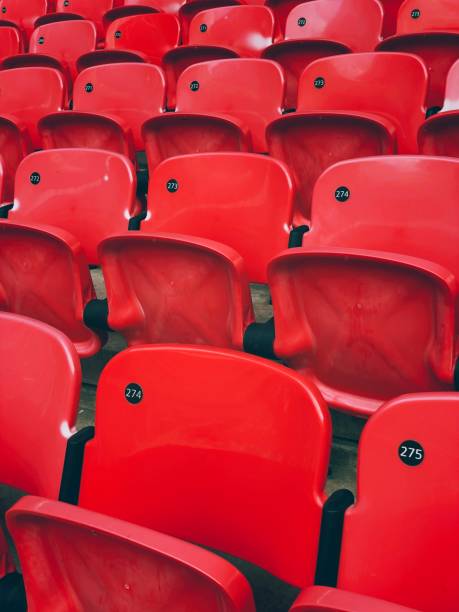 Rows of empty seats in a sports stadium.