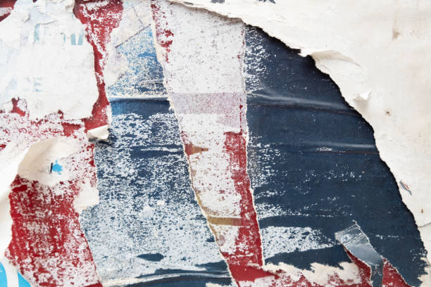 istock Torn street poster background. Abstract weathered paper collage 1412615345