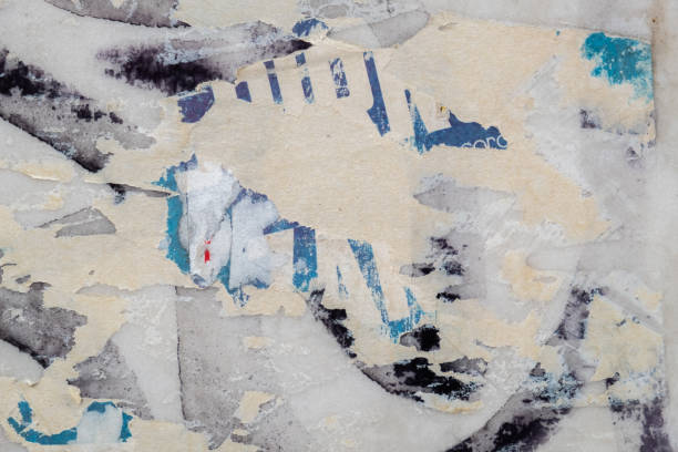 istock Torn street poster background. Abstract weathered paper collage 1412615496