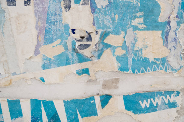istock Torn street poster background. Abstract weathered paper collage 1412615529