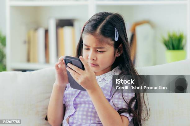 Child Symptoms Of Myopia Stock Photo - Download Image Now - Myopia, Child, Laptop