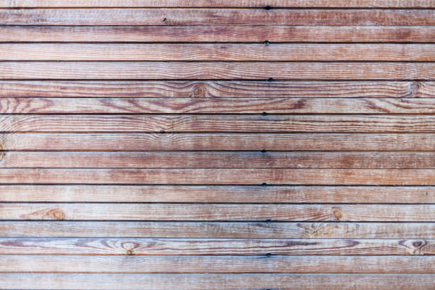 parete giuntata in legno a doghe di legno - wood rustic close up nail foto e immagini stock