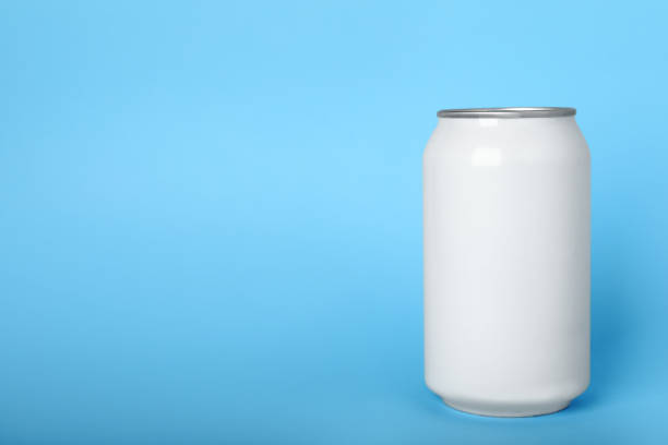 istock Can of energy drink on light blue background, space for text 1412621719