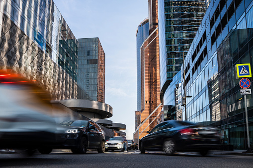 Cars blurred in motion at the modern business quarter