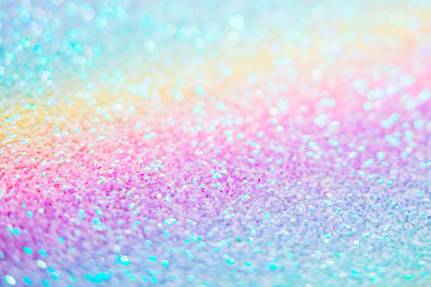 istock Sparkling with rainbow lights unicorn glitter texture 1412626796