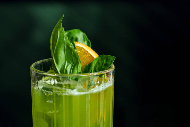 istock Fresh summer green basil cocktail in a glass 1412630188