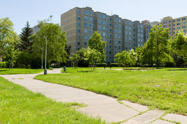 istock Empty pedestrian paths between communist style prefabricated apartment houses in Prague, Czech Republic 1412630470