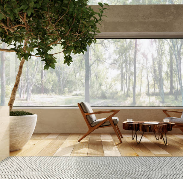 istock 3d rendering. Interior of a modern living room studio with a coffee table and comfortable armchairs. 1412631638