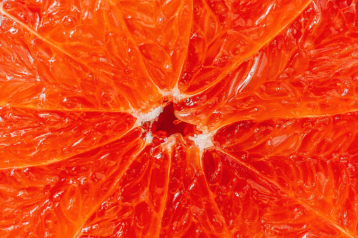 Ruby grapefruit close up macro\nPhoto taken with strobe indoors