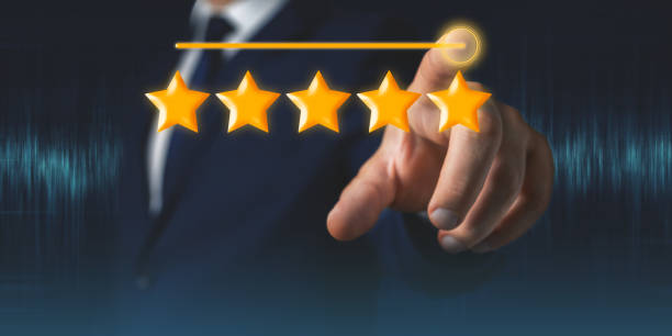 istock Businessman hand touches five stars rating feedback on virtual screen 1412633532