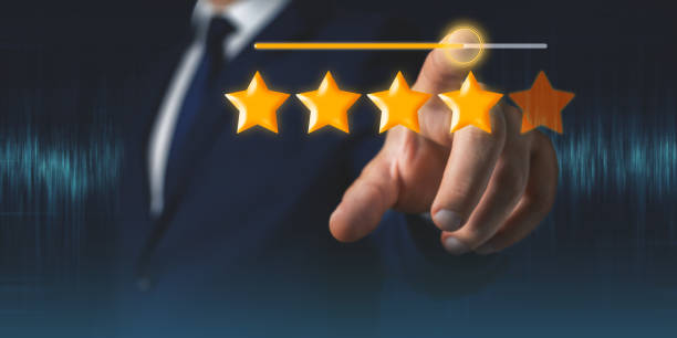 istock Businessman hand touches four stars from five rating feedback on virtual screen 1412633533