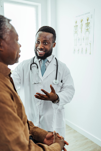 Shot of a senior man having a consultation with his male doctor.