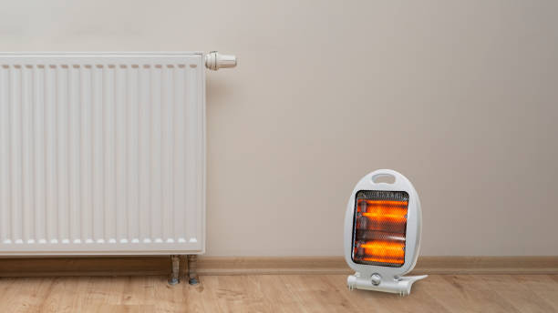 радиатор и обогреватель - electric heater стоковые фото и изображения
