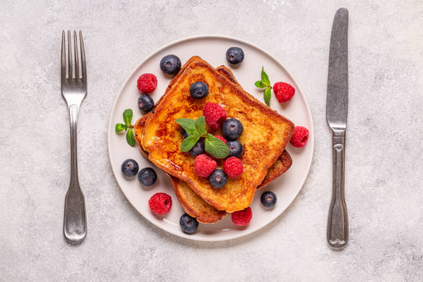 istock French toast with blueberries, raspberries, maple syrup 1412639775
