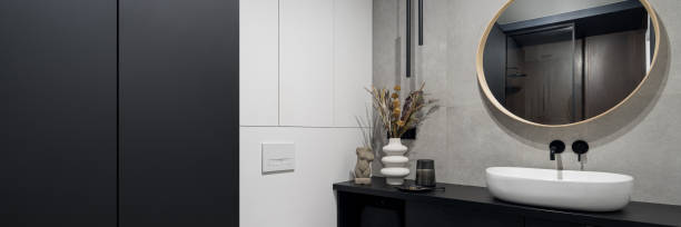 istock Big mirror over washbasin in bathroom, panorama 1412641161