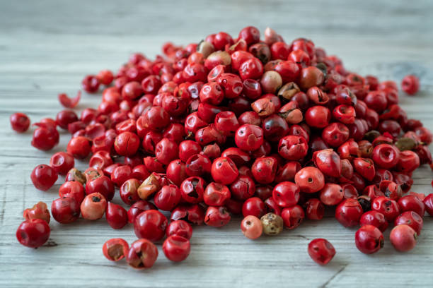 istock Pink or rose brazilian red peppercorns (schinus terebinthifolius) 1412642080