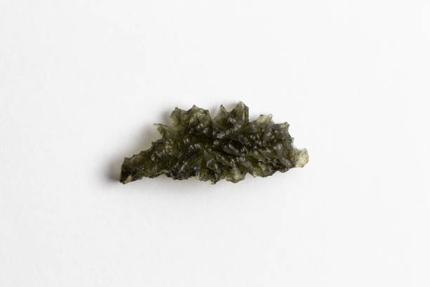 istock Moldavite Specimen Isolated on White Background. Mineralogy collection piece 1412651133