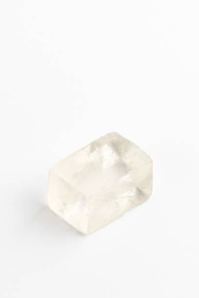 istock Icelandic Spar Crystal on White Background. Calcite. Viking Sunstone 1412651333
