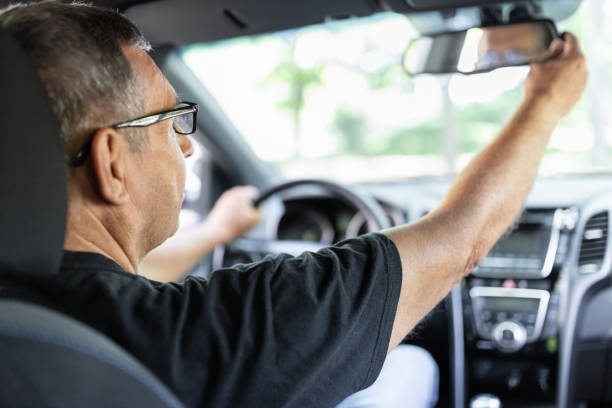 istock Senior in his 70s driving a car 1412652455