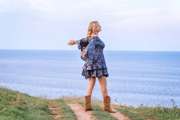 istock Woman embracing nature 1412659968