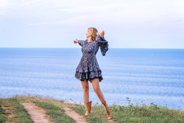 istock Woman embracing nature 1412659971