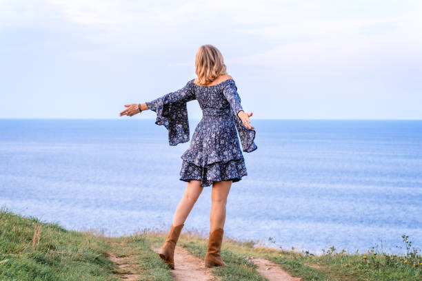 istock Woman embracing nature 1412659973