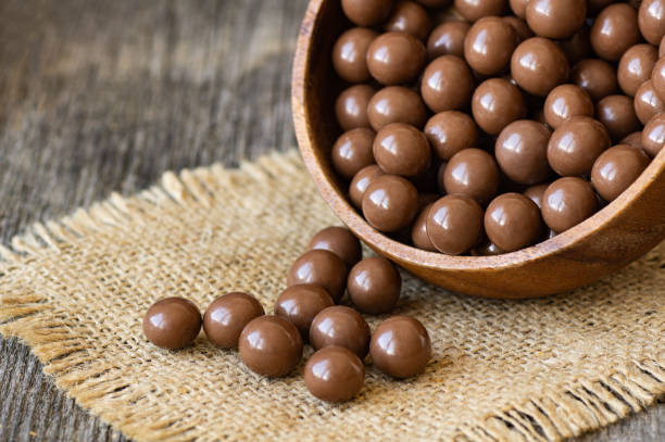 Chocolate covered chickpea, turkish traditional nuts, round small confectionery