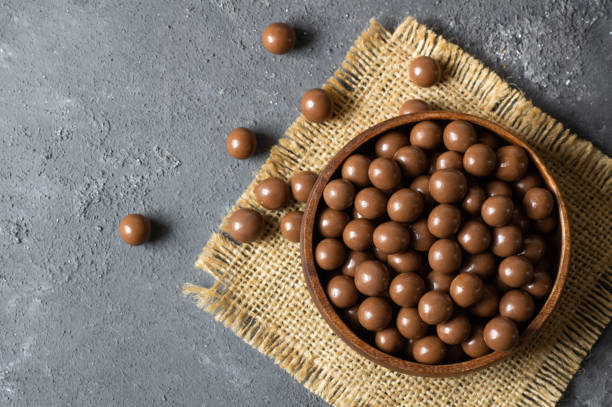Chocolate covered chickpea, turkish traditional nuts, round small confectionery
