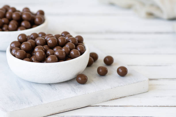 Chocolate covered chickpea, turkish traditional nuts, round small confectionery
