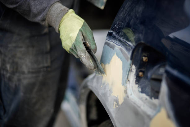 istock car body puttying, body repair, paintwork leveling. 1412667599