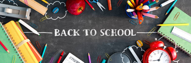 istock Back to school concept with text and school equipment on black chalkboard background 1412668167