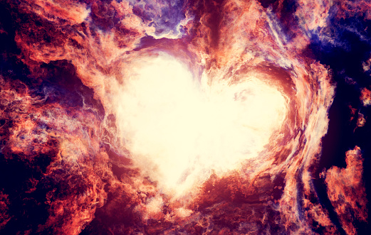 Fantasy heart shape in abstract magical nebula. Love and Valentines day background